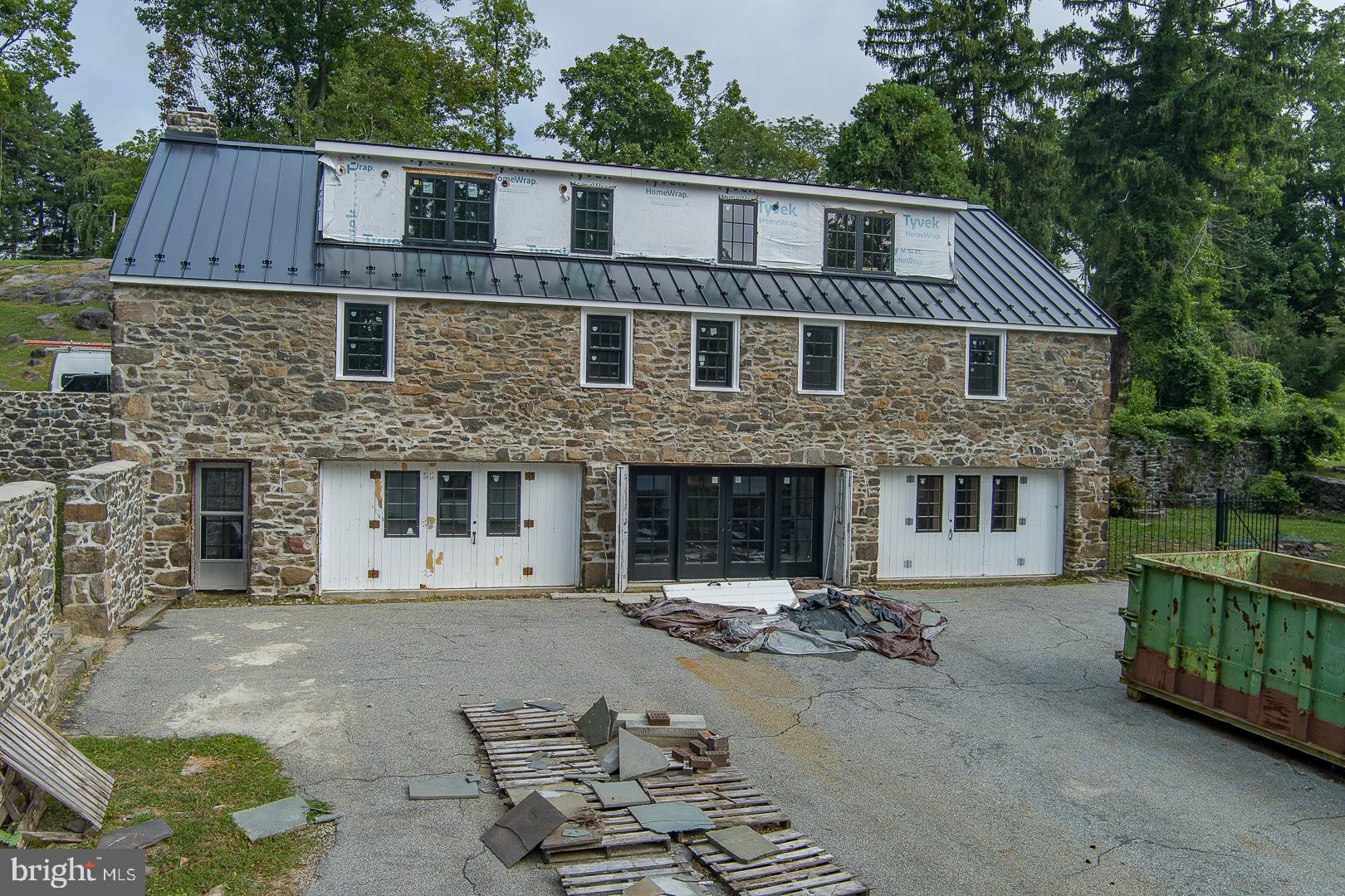 1445 Mt Pleasant Road Villanova, PA 19085 - Photo 3 of 7 a front view of a house with a yard