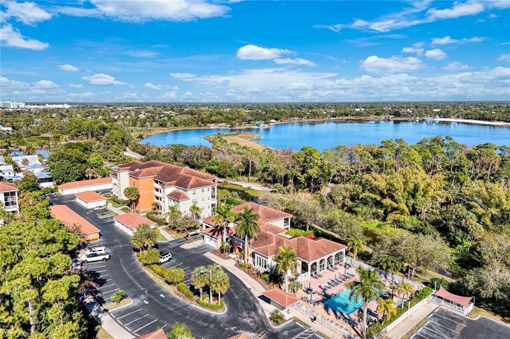 4455 Botanical Pl Circle, Unit 204 Naples, FL 34112 - Photo 2 of 26 a view of a city with an ocean view