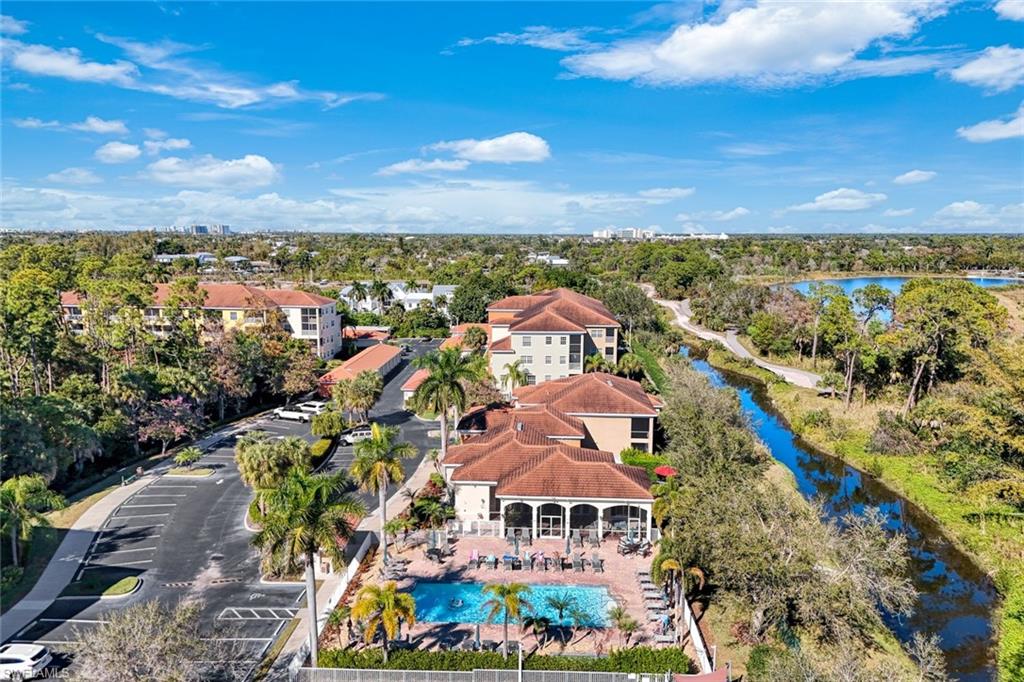 4455 Botanical Pl Circle, Unit 204 Naples, FL 34112 - Photo 25 of 26 a view of a city with mountains in the background