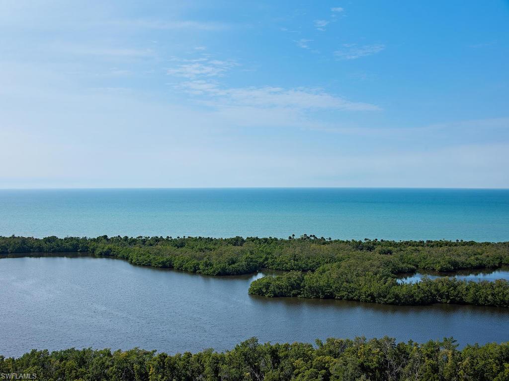 6849 Grenadier Boulevard, Unit 2104 Naples, FL 34108 - Photo 12 of 13 an aerial view of a city