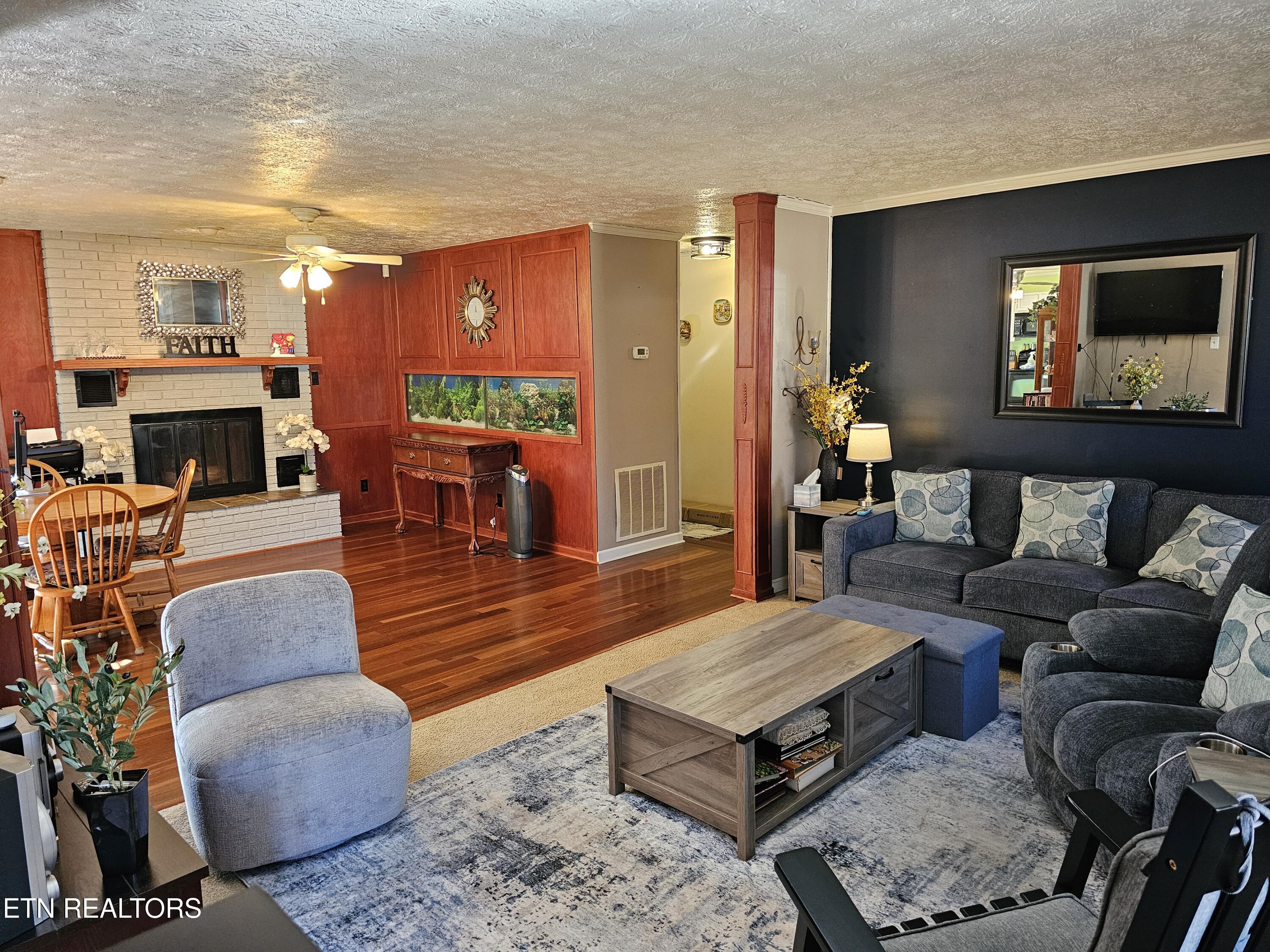 7244 Evanel Way Powell, TN 37849 - Photo 3 of 25 Living Room to Family Room - 7244 Evanel