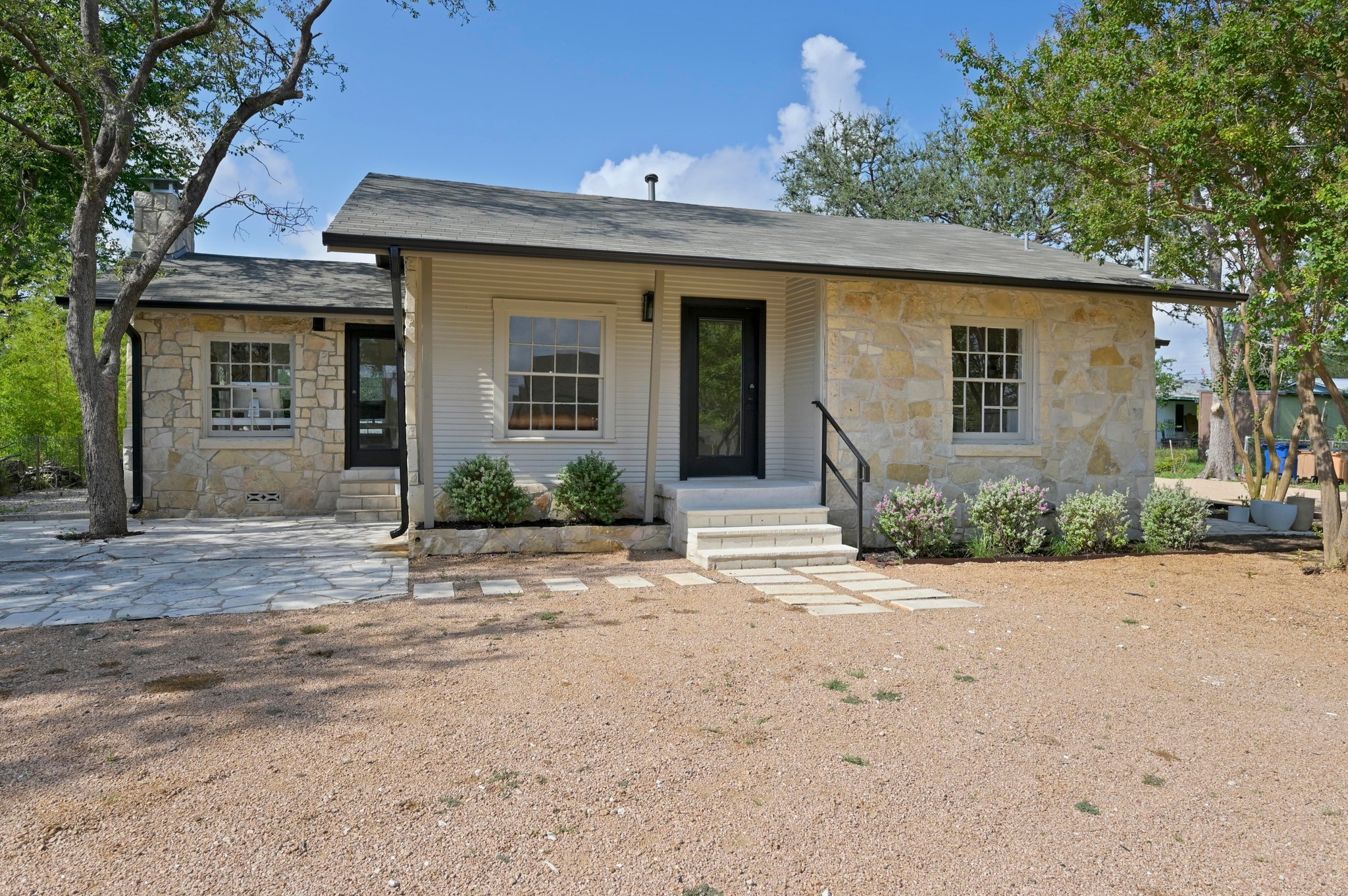 3501 Pecan Springs Road Austin, TX 78723 - Photo 7 of 40 View of front of property featuring stone siding