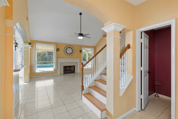 a view of entryway and hall with furniture