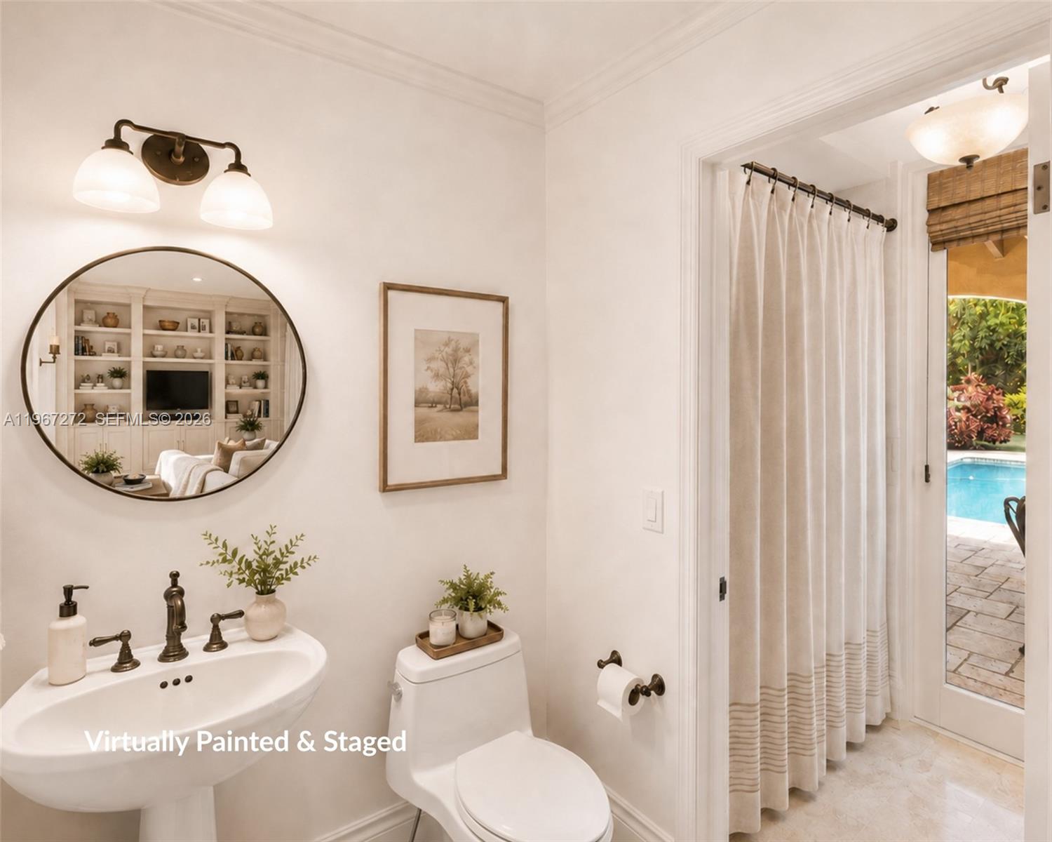 4867 Southwest 82nd Street Miami, FL 33143 - Photo 38 of 65 a bathroom with a toilet and a sink