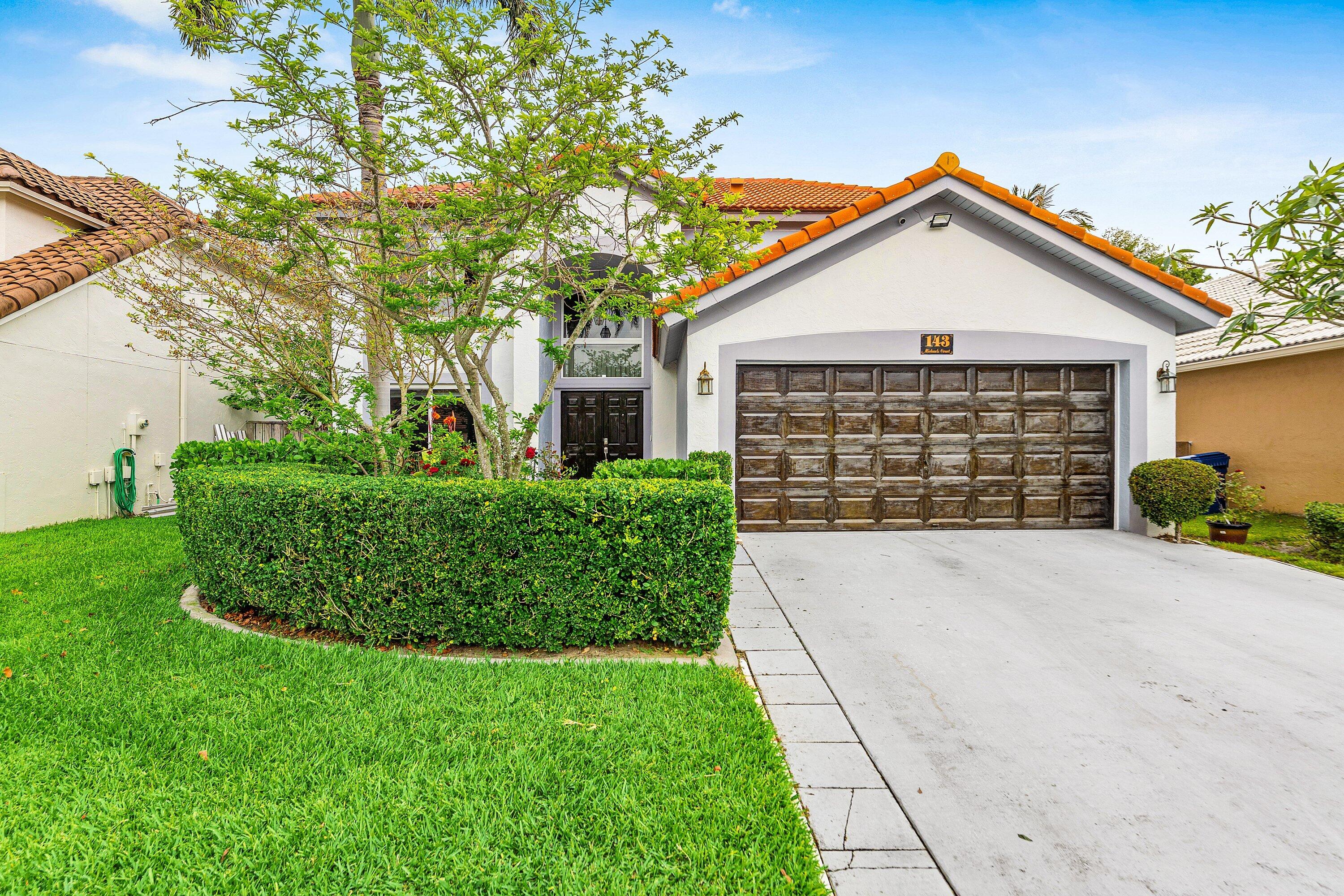 143 St Michaels Court Jupiter, FL 33458 - Photo 1 of 27 Front