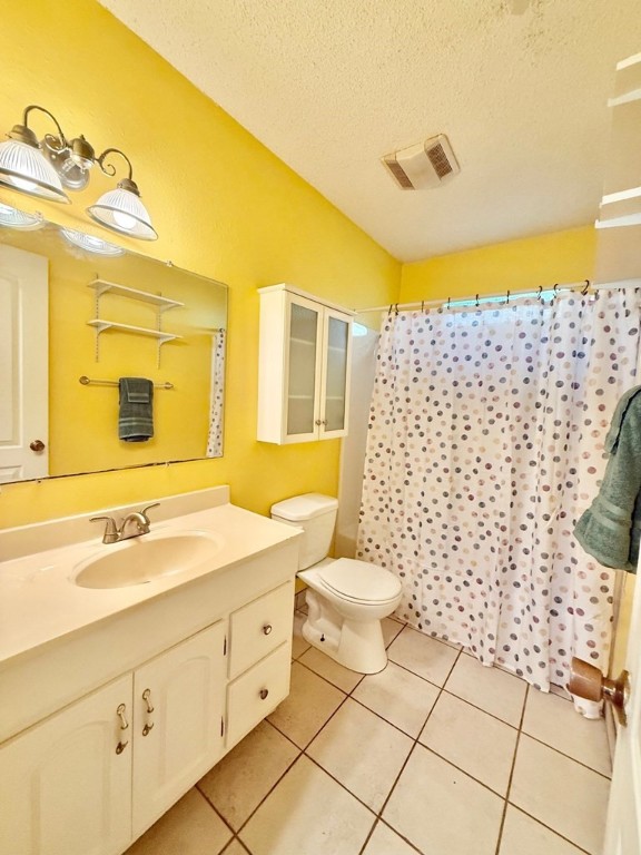402 Myrtle Street Fulton, TX 78382 - Photo 14 of 20 a bathroom with a sink toilet and shower