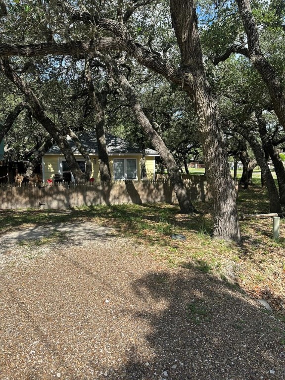 402 Myrtle Street Fulton, TX 78382 - Photo 18 of 20 a view of a yard with a tree