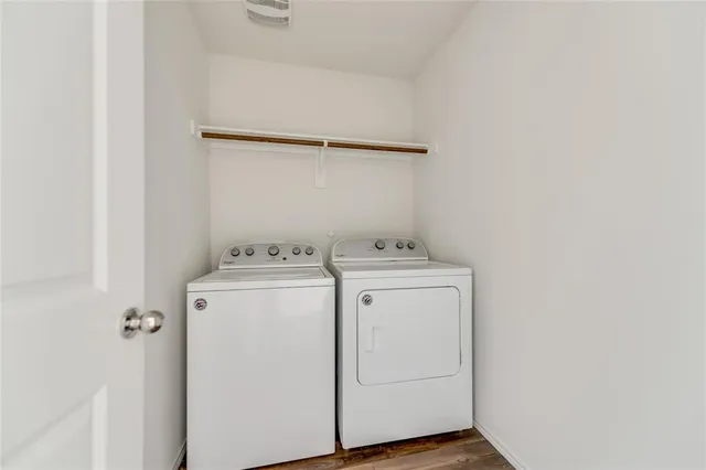 a utility room with dryer and washer