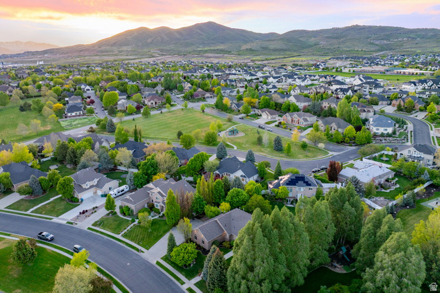 6208 West Bull River Road Highland, UT 84003 - Photo 89 of 90 Residential neighborhood featuring mature trees, paved streets, and a mountain backdrop
