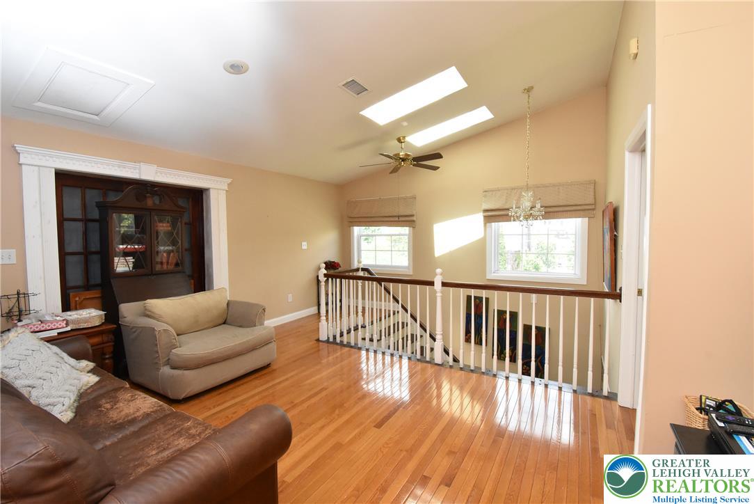424 Grape Street Whitehall, PA 18052 - Photo 37 of 56 This inviting loft features gleaming hardwood floors and abundant natural light from skylights and windows.