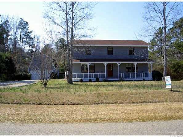 10600 Chelsea Drive Raleigh, NC 27603 - Photo 1 of 1 a view of a house with a yard