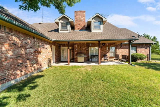 a view of a living room and dining room