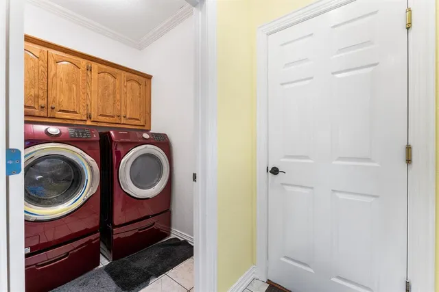 a bathroom with a granite countertop toilet sink mirror and shower