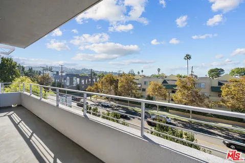 a view of city from a balcony