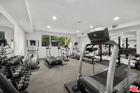 a view of a room with gym equipment