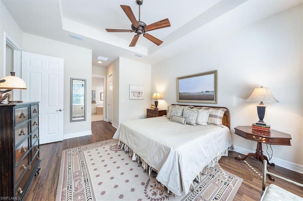 13644 Mandarin Circle Naples, FL 34109 - Photo 9 of 20 Primary Bedroom with 2 walk-in closets