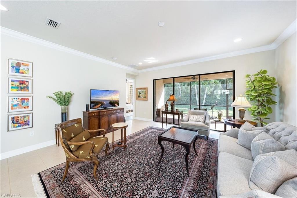 13644 Mandarin Circle Naples, FL 34109 - Photo 2 of 20 Great Room with access to private lanai and backyard