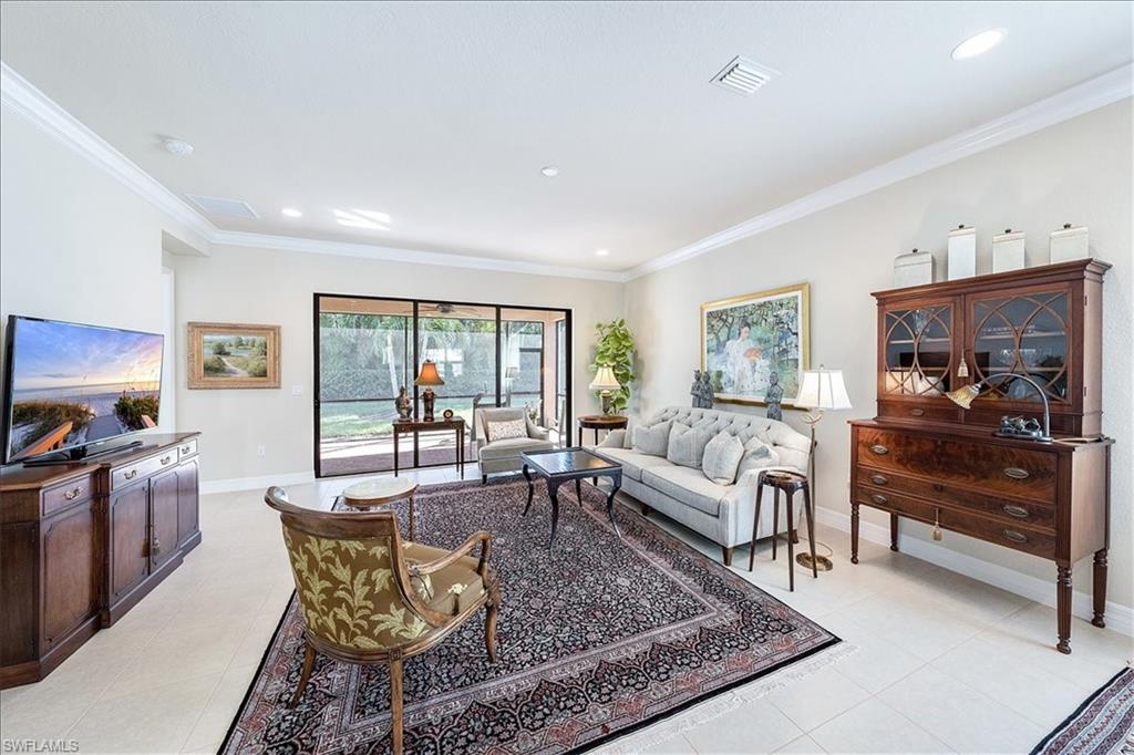 13644 Mandarin Circle Naples, FL 34109 - Photo 3 of 20 Featuring Crown Molding , Neutral finishes and upgraded recessed lighting