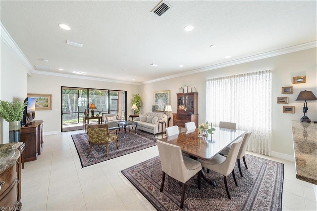 13644 Mandarin Circle Naples, FL 34109 - Photo 4 of 20 Light & Bright Dining & Living area combination