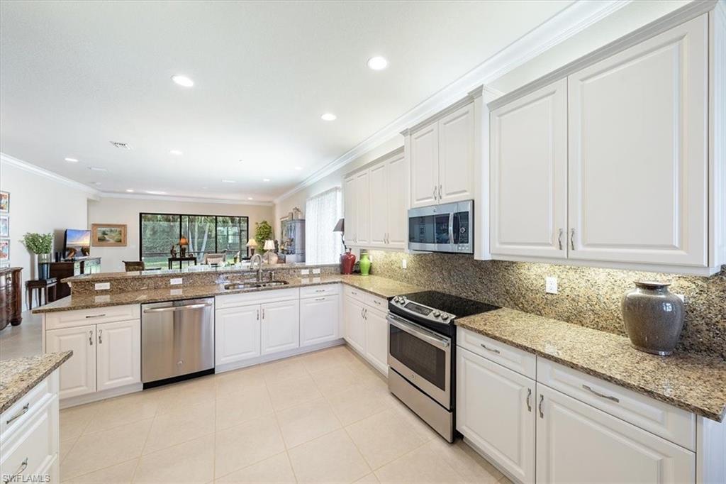 13644 Mandarin Circle Naples, FL 34109 - Photo 20 of 20 Kitchen upgraded to create open floorplan