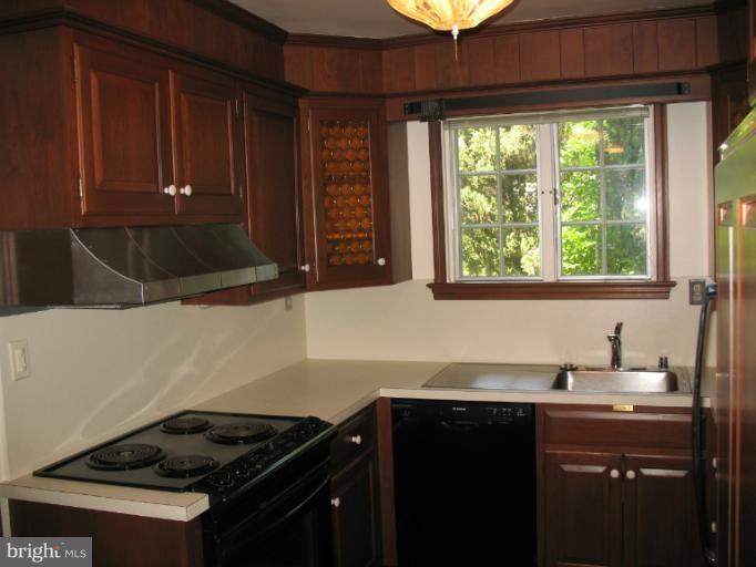 602 Coventry Road Towson, MD 21286 - Photo 12 of 28 a kitchen with a sink and a window
