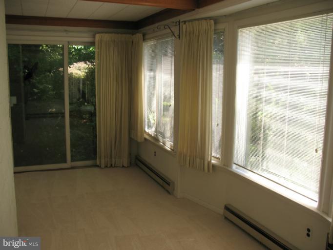602 Coventry Road Towson, MD 21286 - Photo 19 of 28 a view of an empty room and window