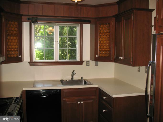 602 Coventry Road Towson, MD 21286 - Photo 20 of 28 a kitchen with a sink and a window