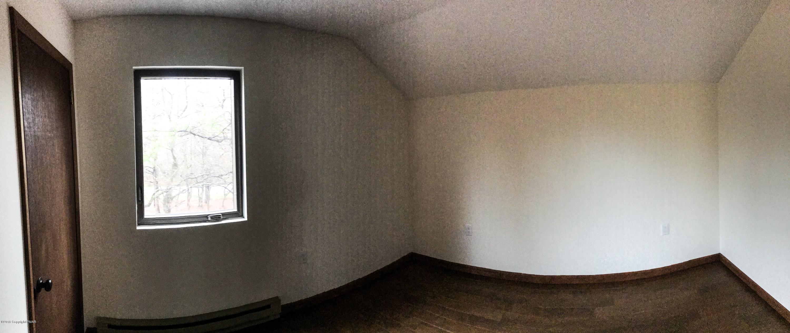 219 Ryan Road Blakeslee, PA 18610 - Photo 10 of 16 a view of wooden floor in a room