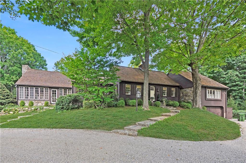 23 Saunders Lane Ridgefield, CT 06877 - Photo 1 of 1 front view of a house with a yard
