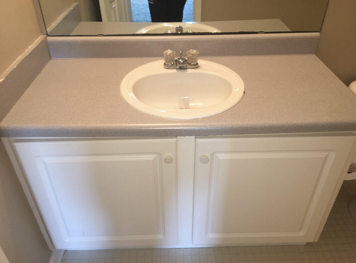506 Keystone Road Mary Esther, FL 32569 - Photo 11 of 17 a bathroom with a sink and a mirror
