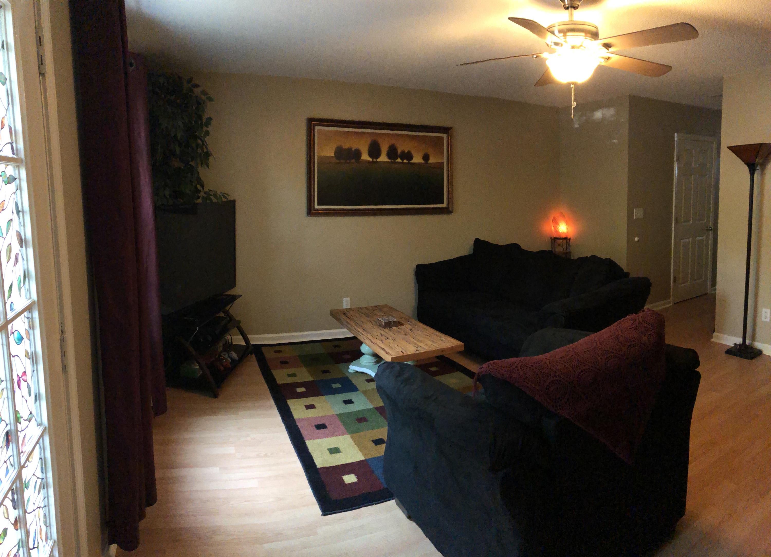 506 Keystone Road Mary Esther, FL 32569 - Photo 3 of 17 a living room with furniture and a chandelier