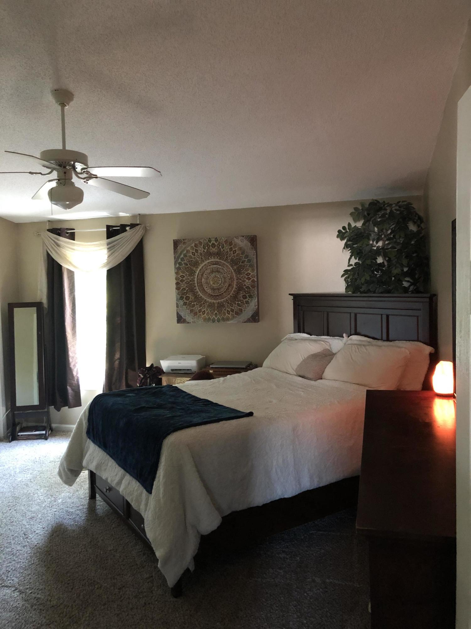 506 Keystone Road Mary Esther, FL 32569 - Photo 5 of 17 a bedroom with a bed and window