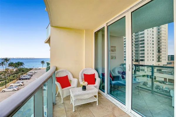 a view of balcony with patio