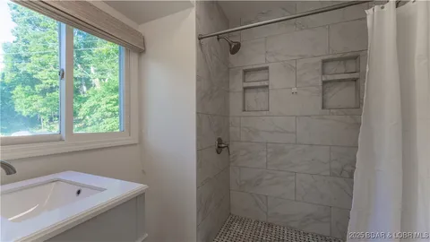 $365,000 | 1145 & Lots 46 56 Camp Branch Road, Sunrise Beach, MO 65079