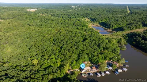 $365,000 | 1145 & Lots 46 56 Camp Branch Road, Sunrise Beach, MO 65079