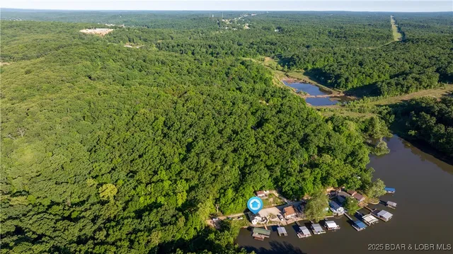 $365,000 | 1145 & Lots 46 56 Camp Branch Road, Sunrise Beach, MO 65079