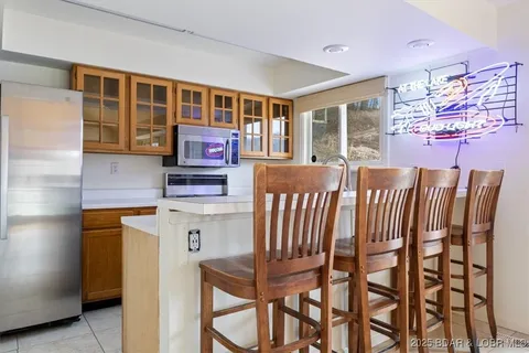 $365,000 | 1145 & Lots 46 56 Camp Branch Road, Sunrise Beach, MO 65079