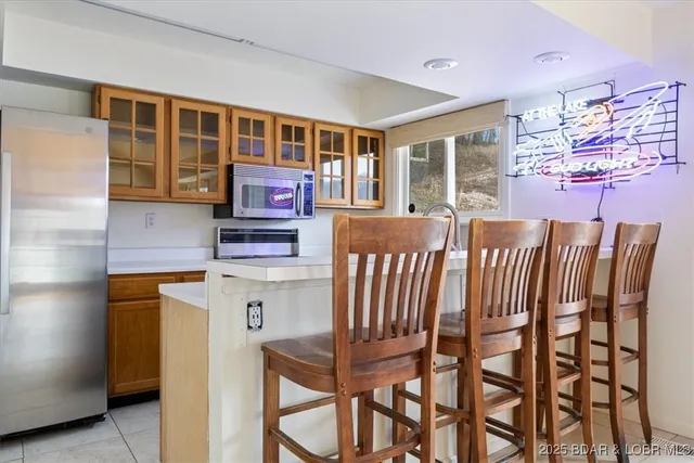 $365,000 | 1145 & Lots 46 56 Camp Branch Road, Sunrise Beach, MO 65079