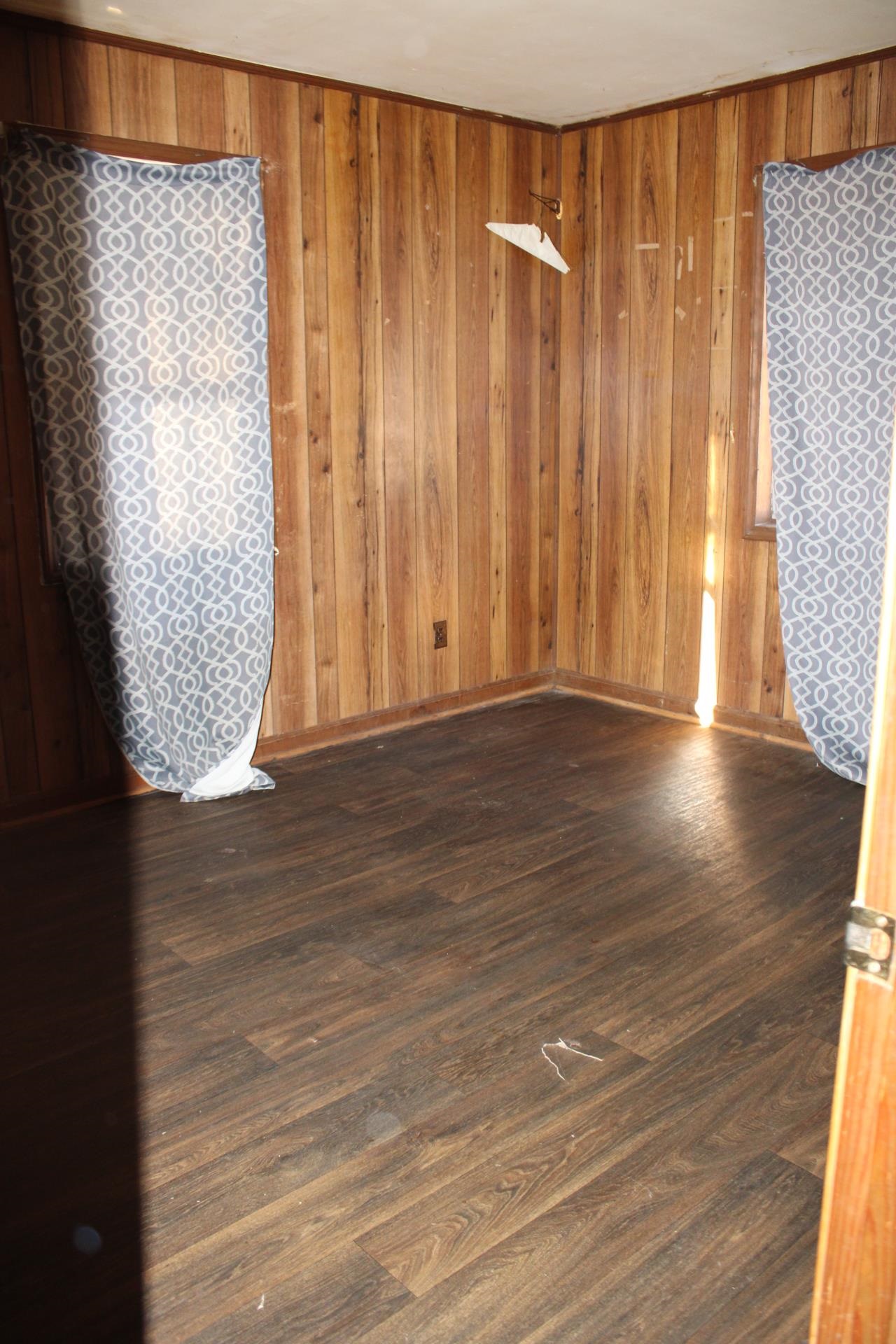 146 Center Street Ripley, TN 38063 - Photo 16 of 18 a view of a room with wooden floor and large window