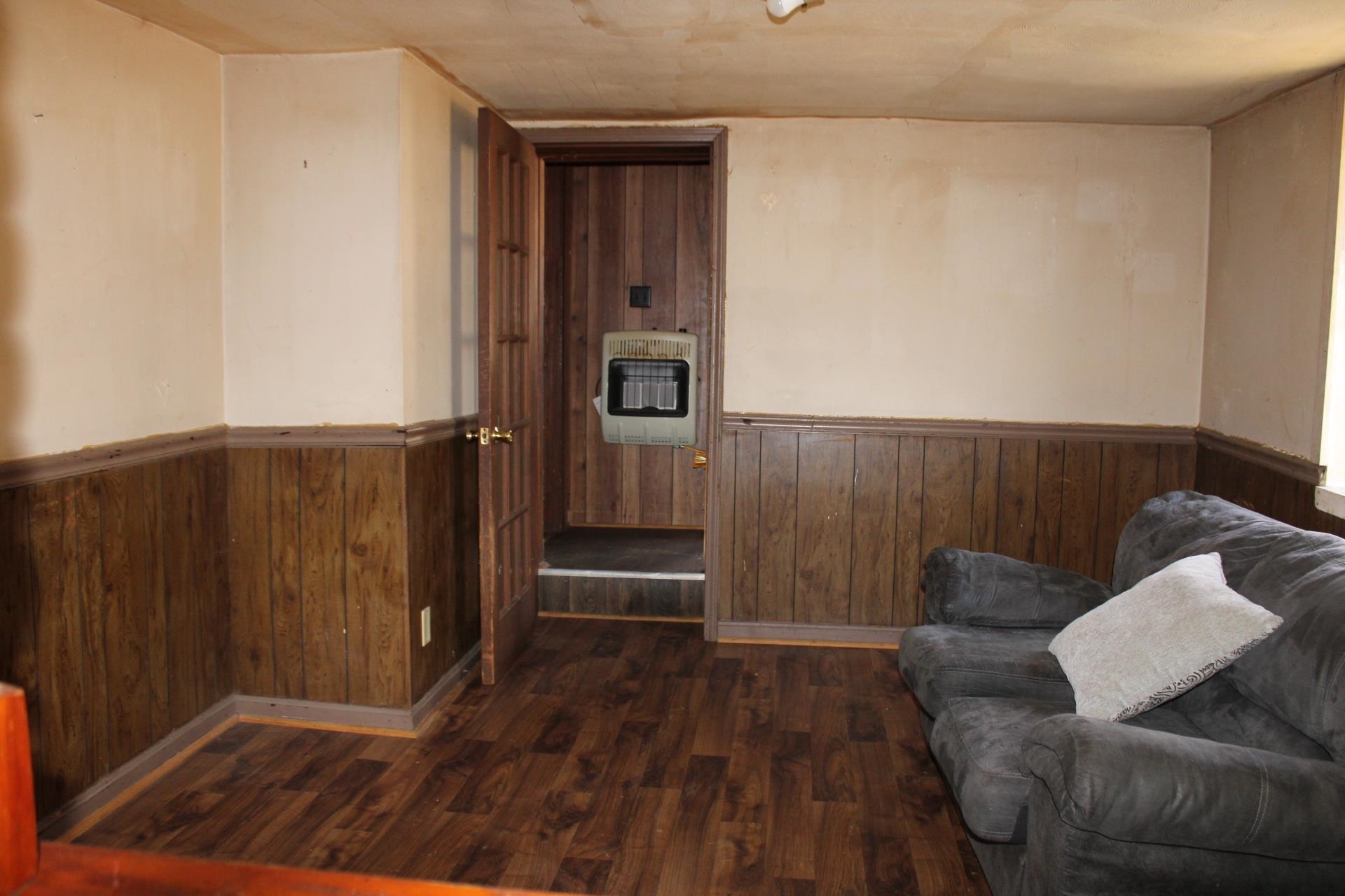 146 Center Street Ripley, TN 38063 - Photo 6 of 18 a living room with furniture and wooden floor