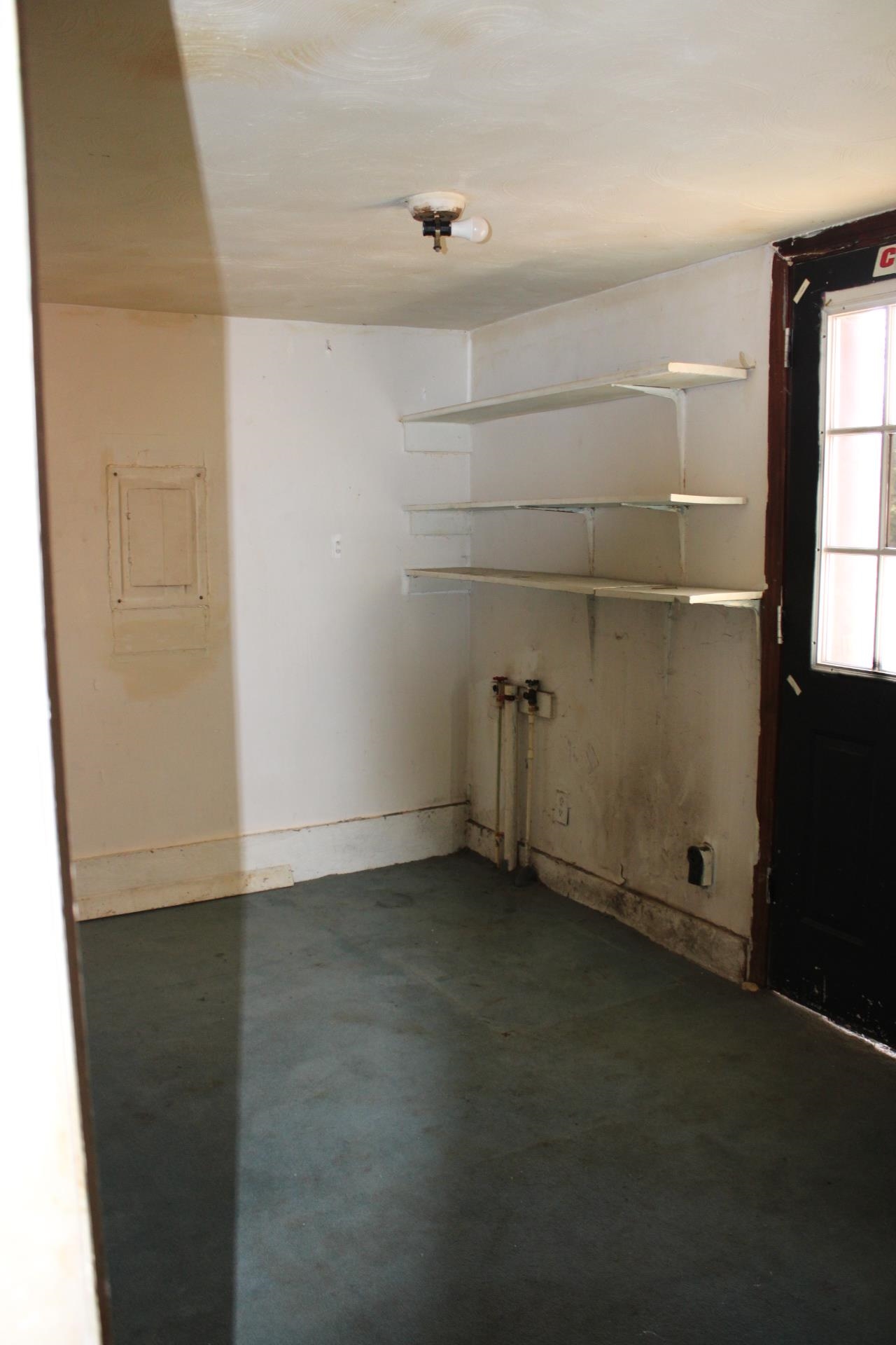 146 Center Street Ripley, TN 38063 - Photo 9 of 18 an empty room with windows
