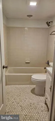 a bathroom with a sink a vanity and a mirror