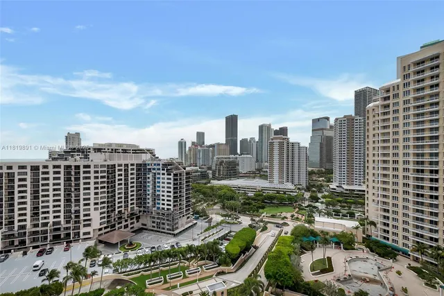 a view of a city with tall buildings