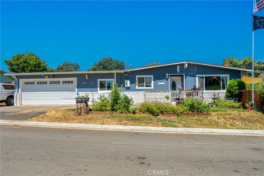 14415 Ridge Road Clearlake, CA 95422 - Photo 2 of 28 front view of a house with a porch
