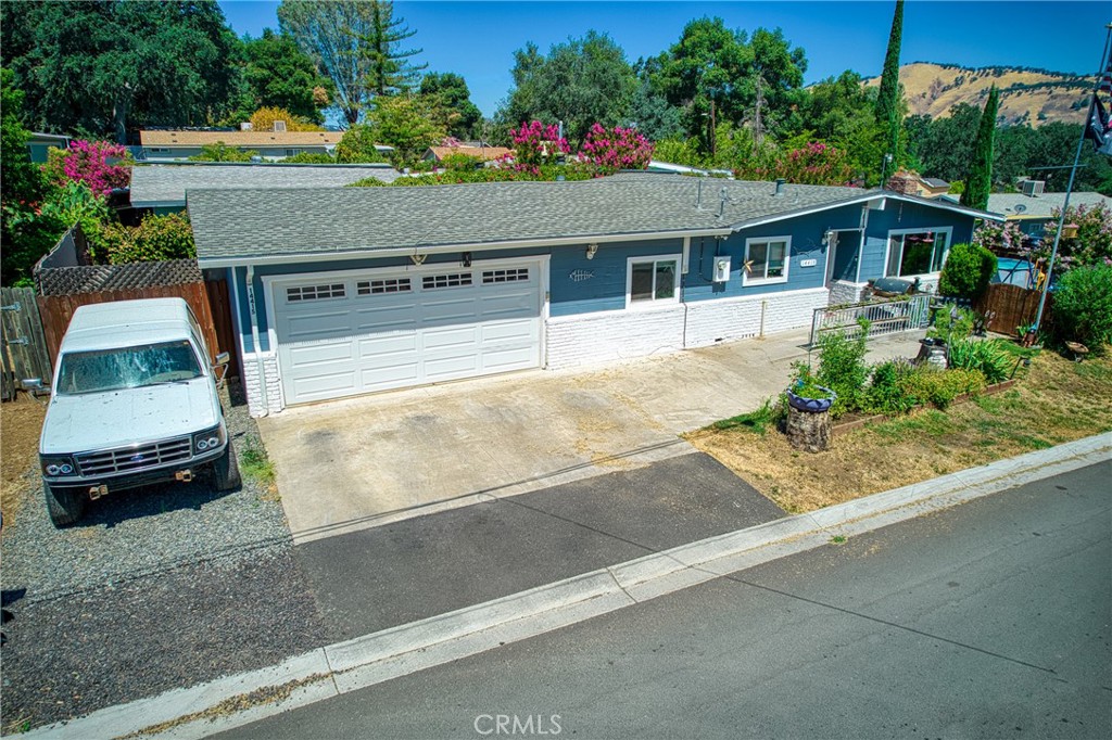 14415 Ridge Road Clearlake, CA 95422 - Photo 3 of 28 an outdoor view of the house