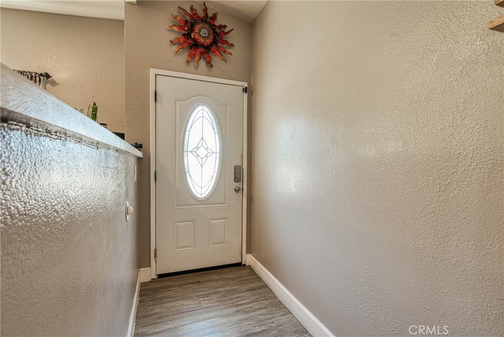 14415 Ridge Road Clearlake, CA 95422 - Photo 5 of 28 a view of front door with wooden floor
