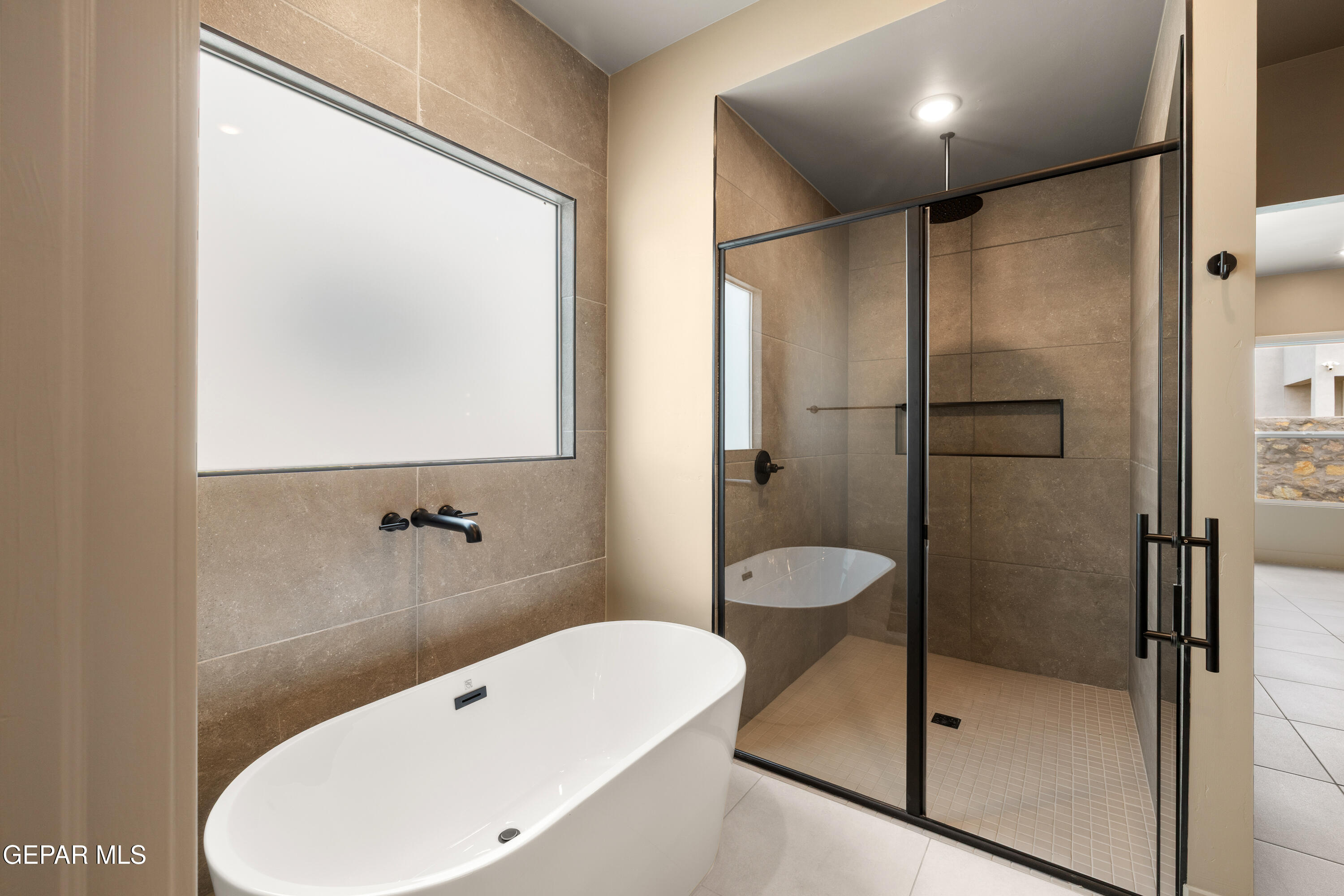 7436 Cimarron Rim Drive El Paso, TX 79911 - Photo 12 of 18 a bathroom with a toilet and a shower