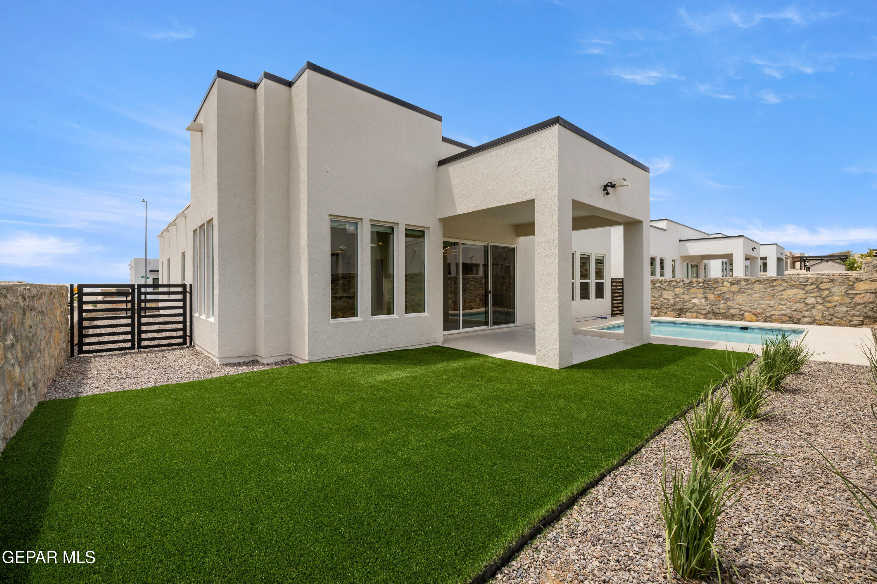 7436 Cimarron Rim Drive El Paso, TX 79911 - Photo 16 of 18 a view of a back yard of the house