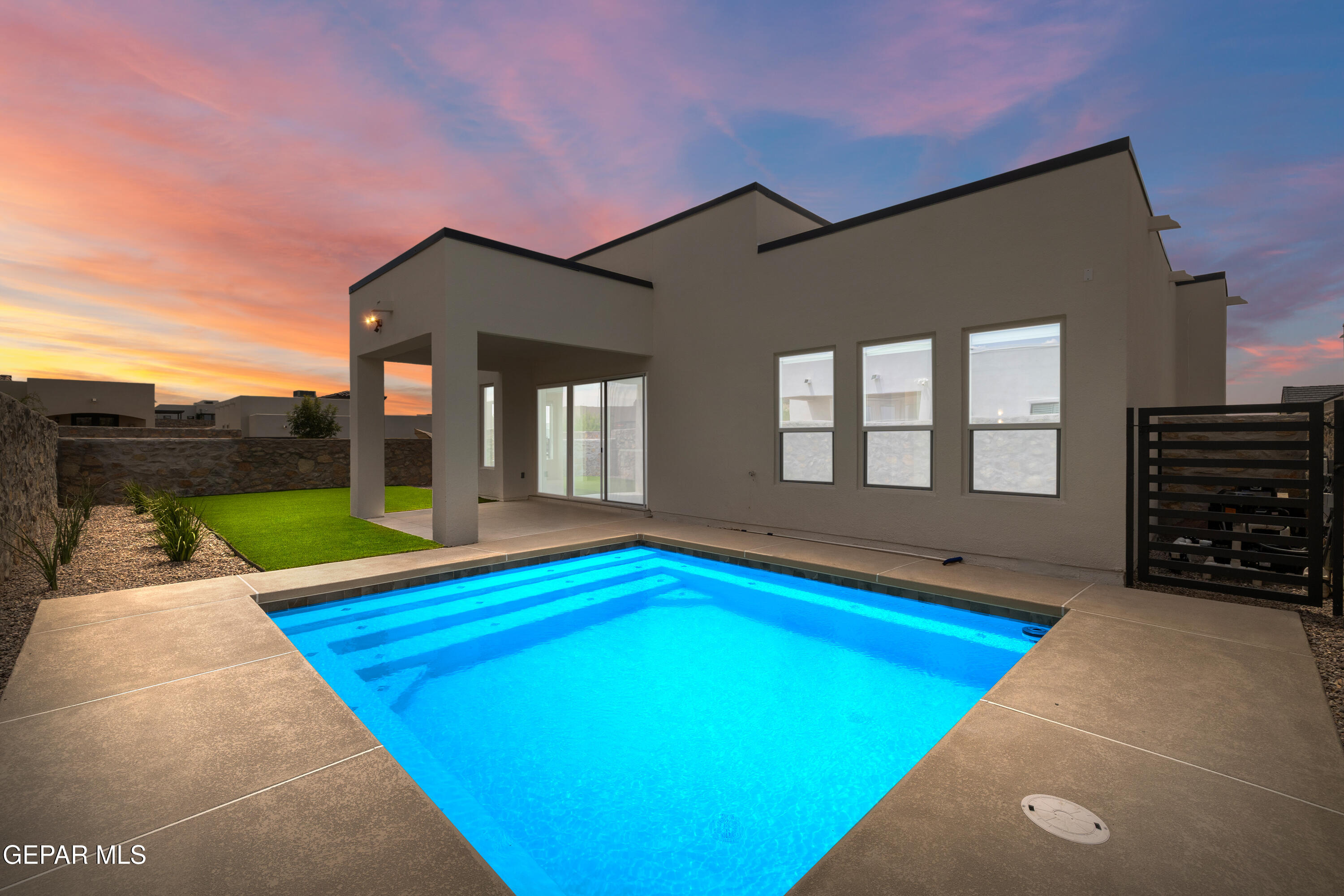 7436 Cimarron Rim Drive El Paso, TX 79911 - Photo 17 of 18 a view of pool with porch and furniture