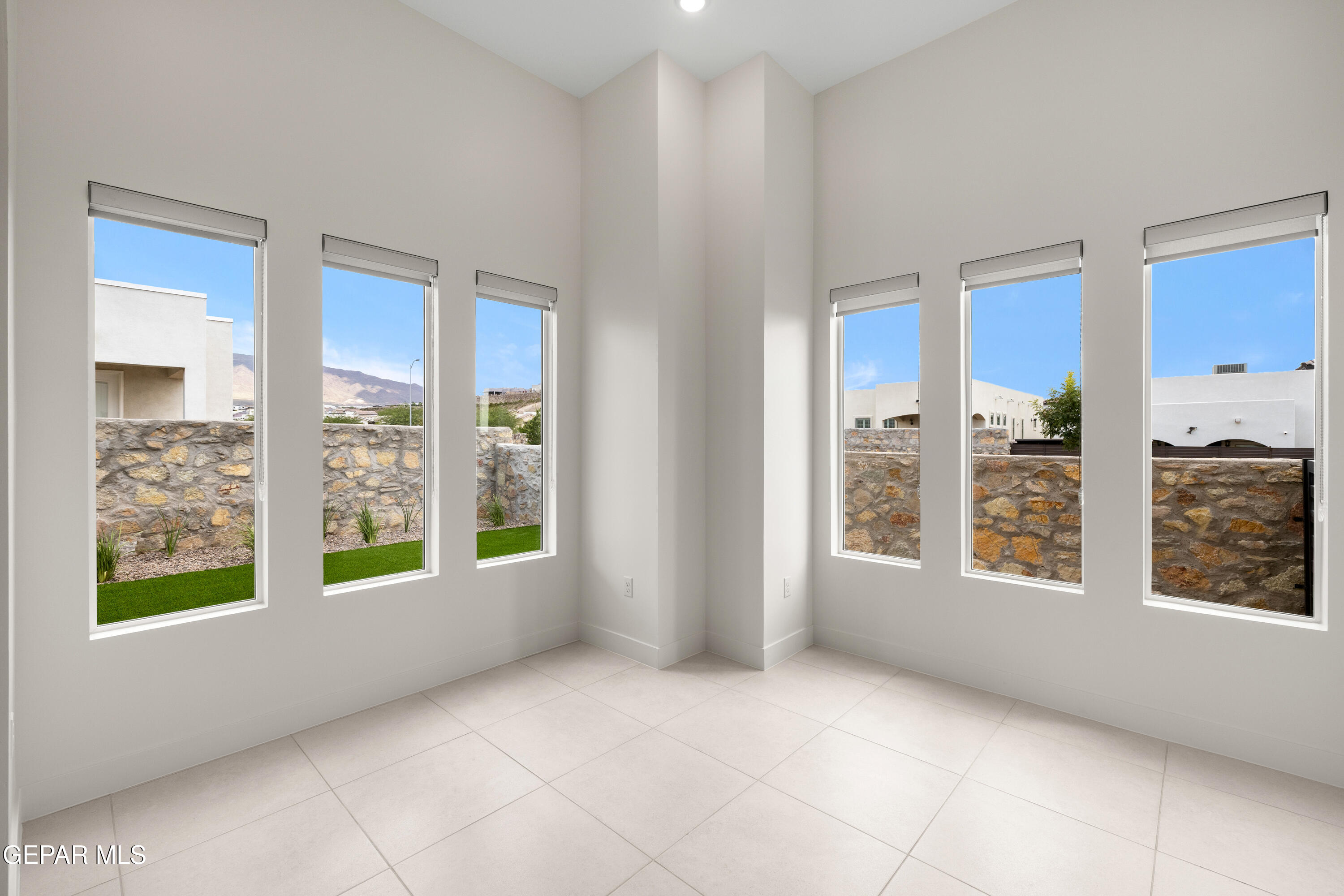 7436 Cimarron Rim Drive El Paso, TX 79911 - Photo 8 of 18 a view of an empty room with a window